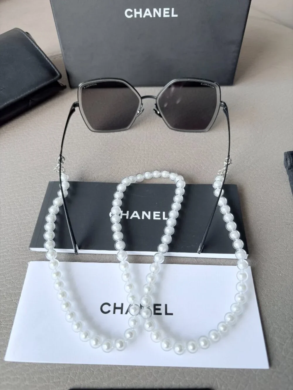 Chanel Butterfly Sunglasses featuring a removable pearl chain